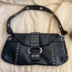 Purse/clutch very versatile 