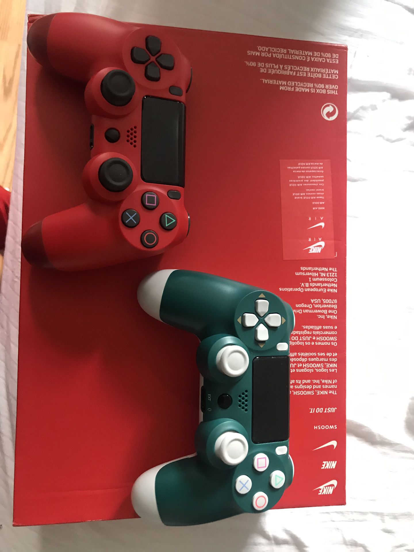 Two PS4 Controllers Red and Green