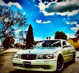 Infiniti q45T, pearl cream , full size sedan