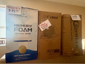 Check prices in picture. New in box twin mattress toppers.