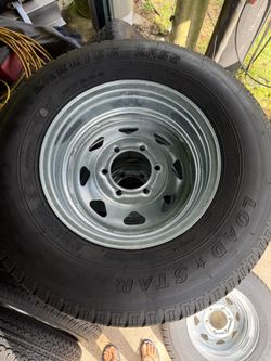 New 225-75-15inch Trailer tires with 6-lug galvanized rims.  10-ply. In Stock. 