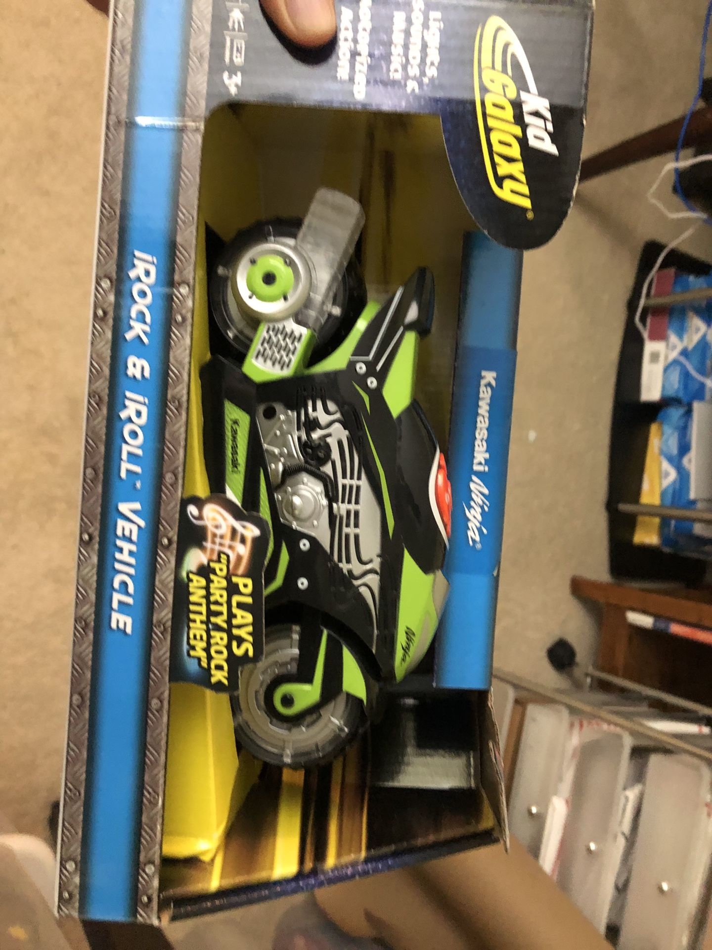 Kid galaxy Kawasaki ninja rock and roll motorcycle in box