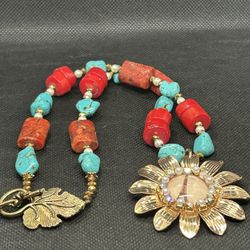 turquoise and red beaded necklace w/ Gold Flower Shaped Eiffel Tower Pendant 