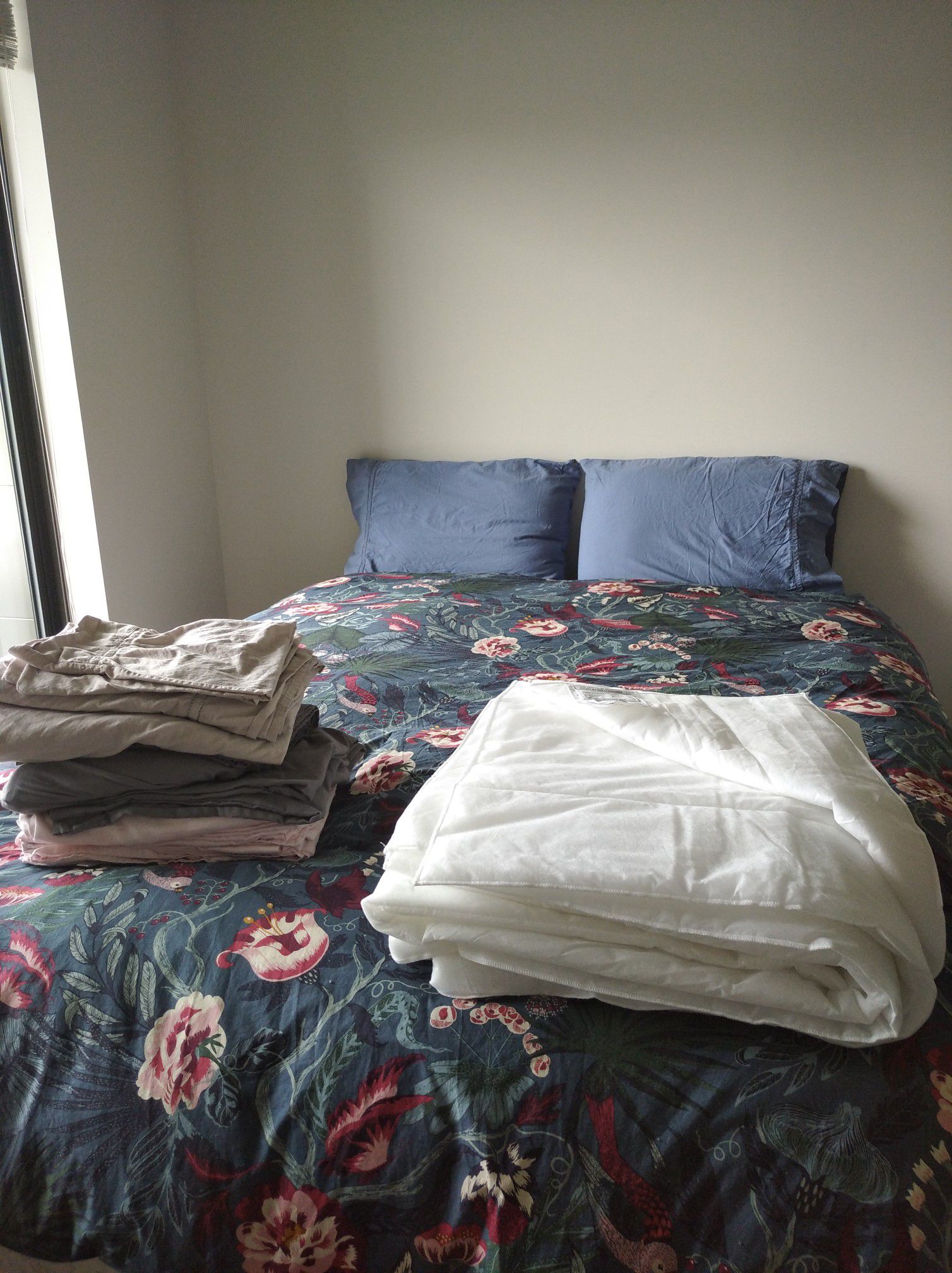 Box spring bed, mattress, two pillows, summer and winter comforters and four sets of sheets