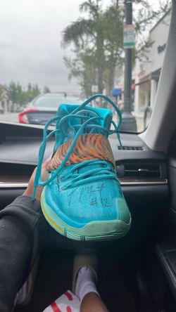 Game worn Ja Morant shoes that are signed personally by him