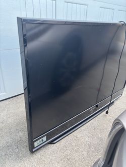 Flat screen tv for free tv stand included