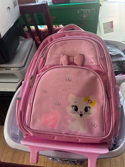 Pink backpack with weels