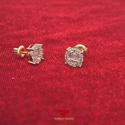 Fancy 10K Gold 0.63 CTW of round and baguette Diamond earring 