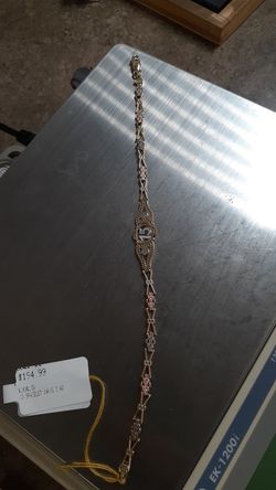 I'd bracelet 14k ,gr 5. 4, 7" inches