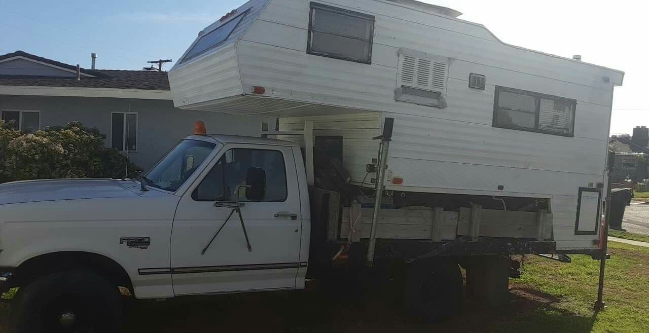 7.3 flatbed diesel with long bed cab over camper.. for Sale in Anaheim