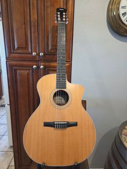 Taylor guitar 214ce nylon acoustic- electric with case