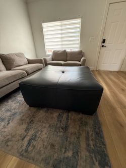 Blue leather ottoman