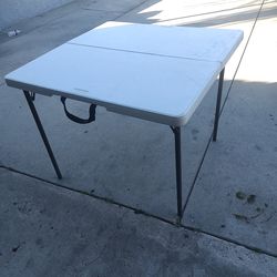 Lifetime 37" x 37" white folding table.     $40