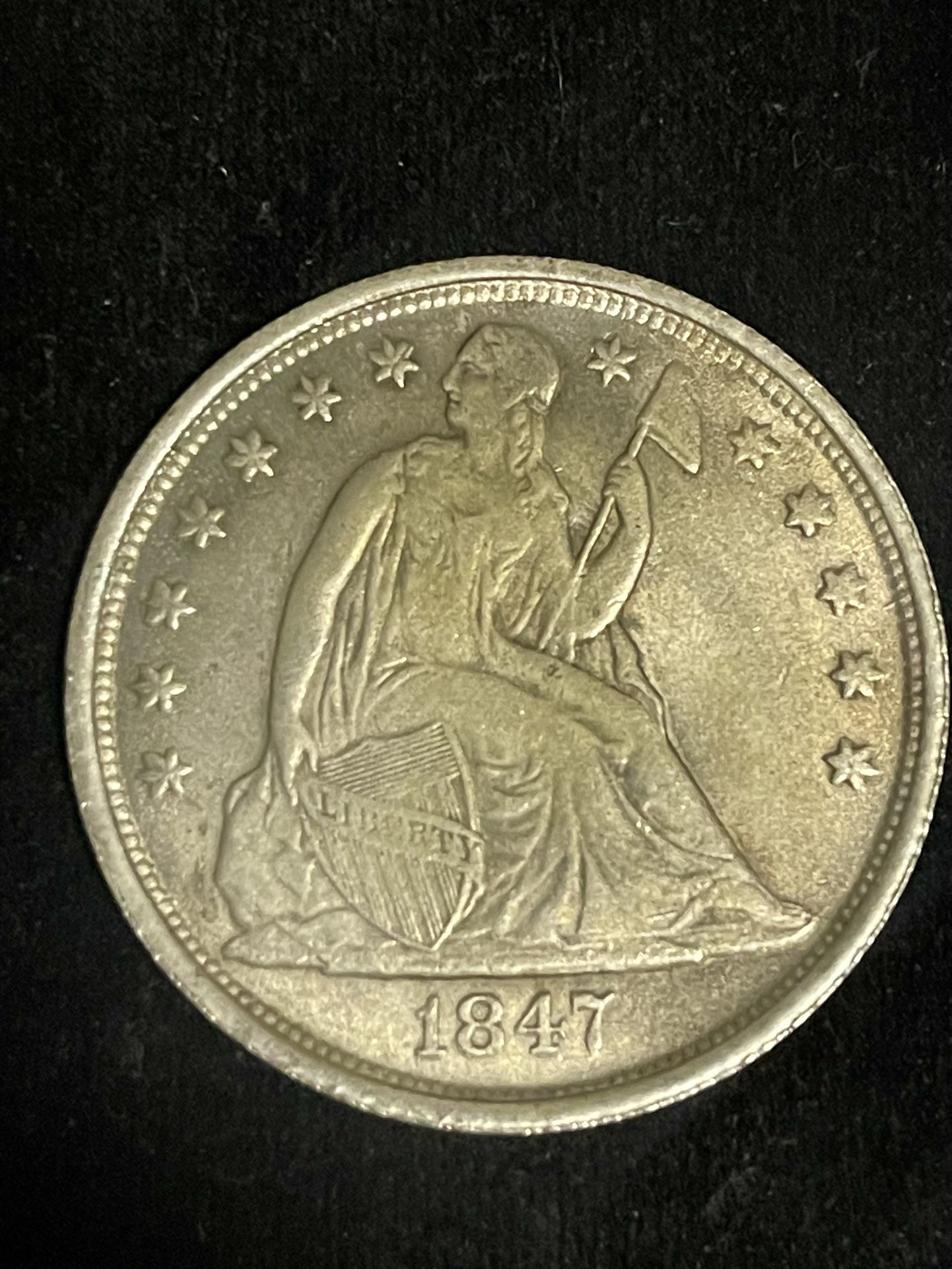1847 P SEATED LIBERTY DOLLAR