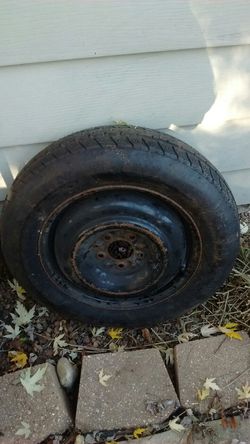Spare tire off a Dodge Caravan 2005