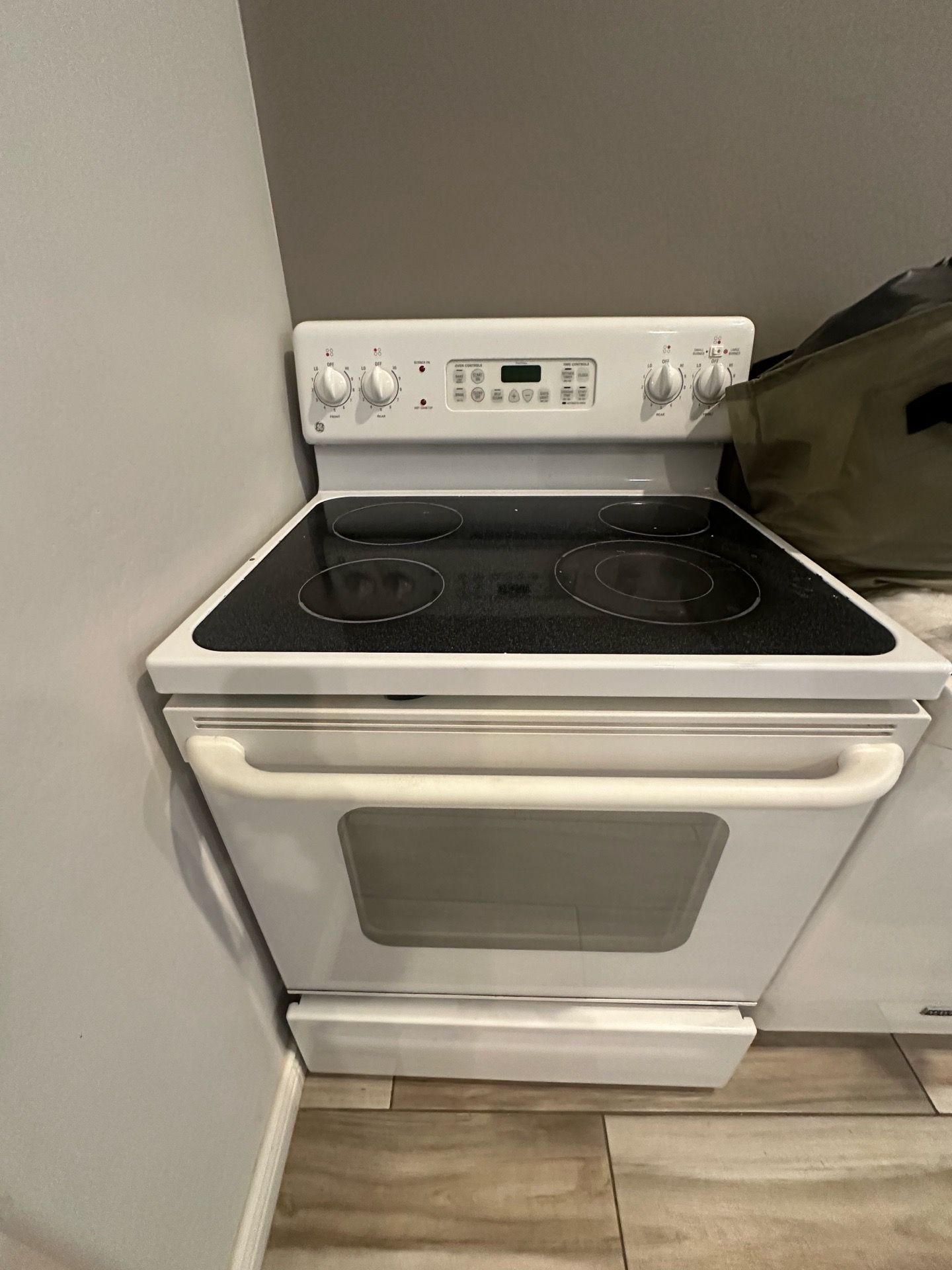 White GE Stove & White Maytag Dishwasher