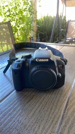 Canon EOS Rebel T5i camera body + EFS 18-55 mm lens