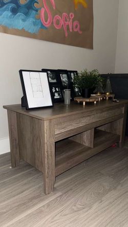 Tea table with lifting top storage