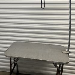 Dog Grooming Table. Sturdy table allows for easy, shampooing, nail clipping and teeth cleaning.
