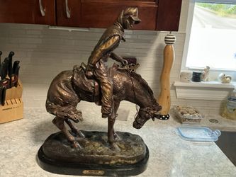 Frederic Remington's "The Norther" (measuring 22"H x 18"L x 9"W) 