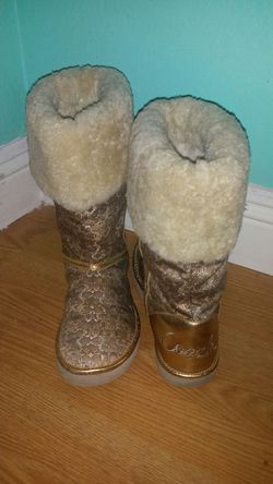 Coach authentic gold boots...size 7....great condition!