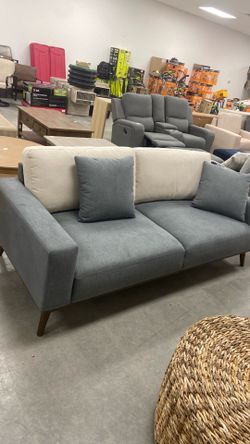 Grey Sofa with White cushions