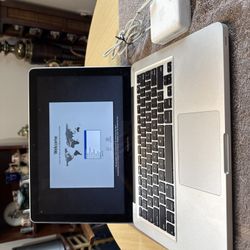 13.3” Apple MacBook Pro (2010) - Intel Core 2 Duo 2.4 GHz, 160GB SSD, 2 GB RAM with the charger. Charger has plastic worn as last picture  