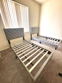 2 gray twin size bed frame