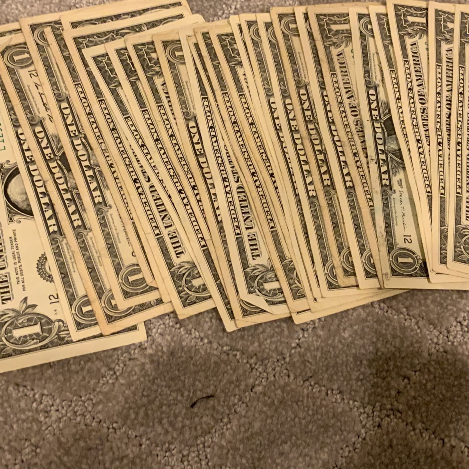 Lots Of One dollar bills if you’re a collector there may be some collectibles in there