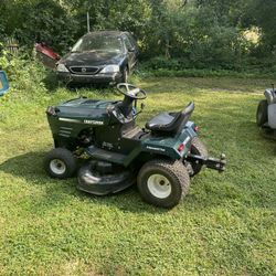 Riding lawnmower And Plow 