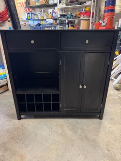 Black cabinet with shelves