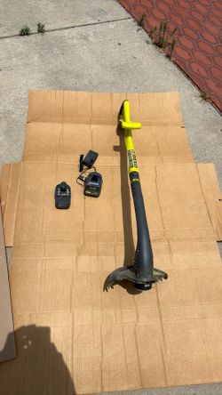Ryobi weedeater with charger and battery