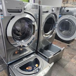 LG SET STEAM WASHER AND ELECTRIC DRYER STAINLESS STEEL WITH SIDEKICK PEDESTAL DOUBLE WASHER 