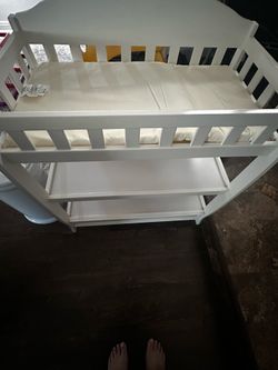 Delta White Changing Table with waterproof pad and straps