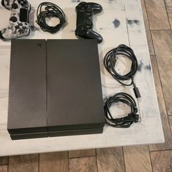 PS4 with Controllers And Games