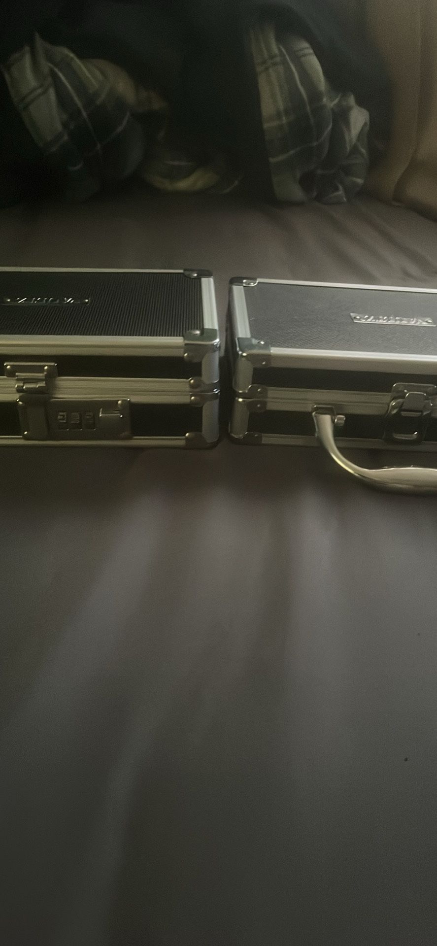 2 Boxes One Locks One Just Closes