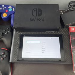 Nintendo Switch w/ Controllers and Pokémon Game