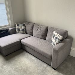 Sectional Couch with Pull Out Bed in