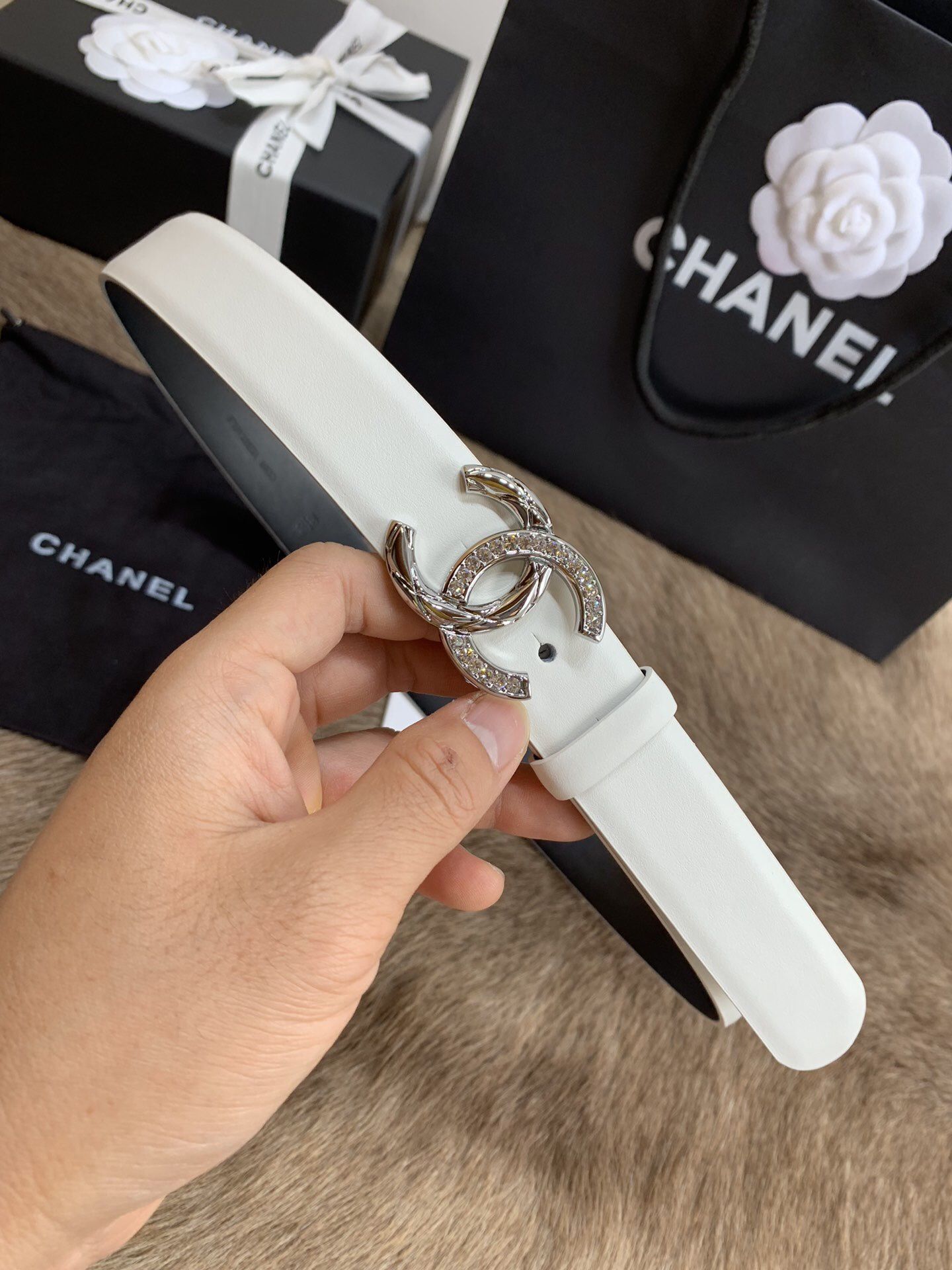 A pair of women's top boutique belt