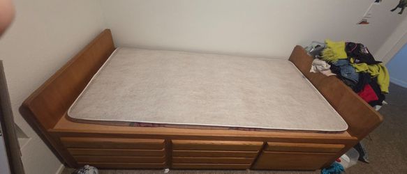 Twin child's bed platform with storage