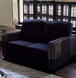 Black couch and loveseat