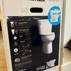 NEW IN BOX: Kohler Gleam Chair Height Elongated Toilet - Smooth Skirted Design