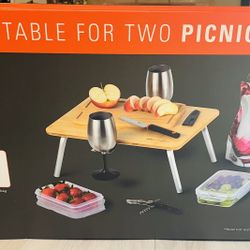 GSI Outdoors Table for Two Picnic Set, which includes a variety of items for outdoor dining.  