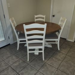 Round white dining room table for chairs
