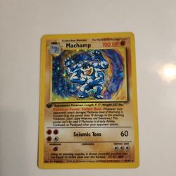 1st Edition Base Set Machamp Pokémon trading card (#8/102).