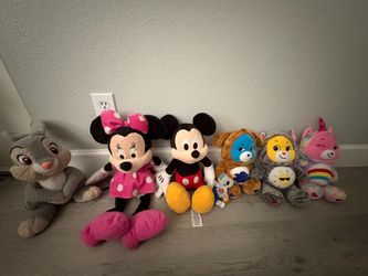 Mickey, Minnie, Thumper, and three Care Bears