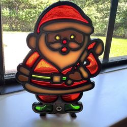 Vintage Christmas Votive Candle Holder Cast Iron Stained Glass Santa Claus in original box with candle.