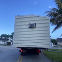 Shed relocated ,,, Movemo Casita De Patio Container Rv Crane 