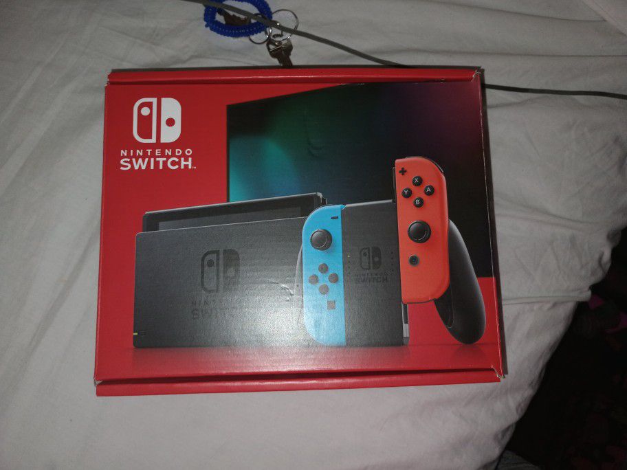 Nintendo Switch Like New. Includes The Handheld Covers Screen Protector Zip Up Carrying Case And Games