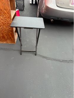 Blue massage table, cabinet, small tables,wreath, flowers with vase,home decorations, lamp, magazine holder